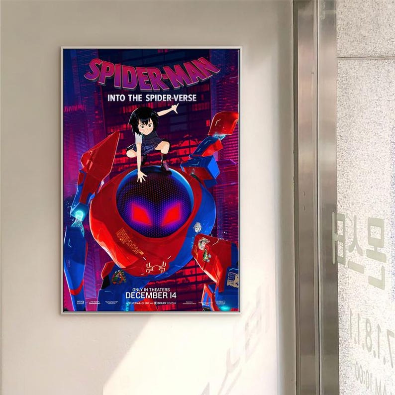 May include: A framed movie poster for "Spider-Man: Into the Spider-Verse." The poster shows a red and blue robot with a character on top. The title is in large, colourful letters. The release date, December 14, is at the bottom.
