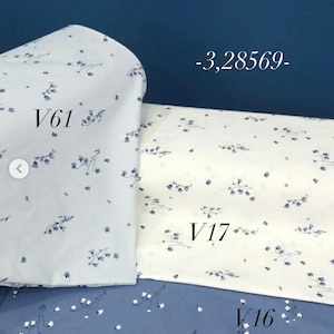 Könnte beinhalten: Drei Stoffmuster mit einem Blumenmuster. Das obere Muster ist hellblau mit weißem Hintergrund und dem Text "V61". Das mittlere Muster ist weiß mit hellblauem Hintergrund und dem Text "V17". Das untere Muster ist dunkelblau mit weißem Hintergrund und dem Text "V16".