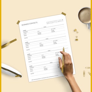 May include: A printable business contact list with sections for name, address, city, state, email, mobile phone, work phone, zip code, title, and notes. The list is on a white sheet of paper with a gold pen and paper clips on a beige surface.