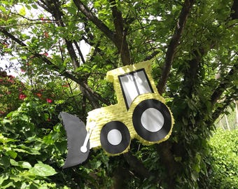 Graafmachine pinata, middelpunt van de bouwpartij