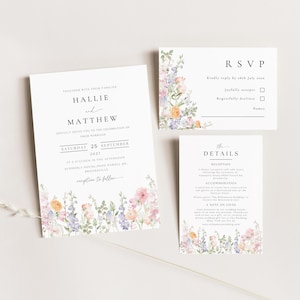May include: Elegant wedding invitation suite featuring floral watercolor designs in pastel colors. The invitation includes the names Hallie and Matthew, date, time, and location. RSVP and details cards complete the set.