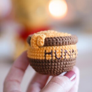 amigurumi pattern
crochet doll pattern
handmade doll
handmade decor diy
cute easy tutorial
craft stuffed toy
honey pot crochet
hunny pooh crochet
winnie the pooh
amigurumi pooh
pooh crochet pattern
hunny pot pooh
pooh amigurumi