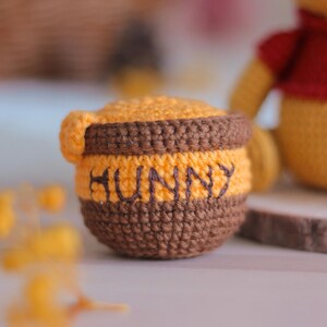 amigurumi pattern
crochet doll pattern
handmade doll
handmade decor diy
cute easy tutorial
craft stuffed toy
honey pot crochet
hunny pooh crochet
winnie the pooh
amigurumi pooh
pooh crochet pattern
hunny pot pooh
pooh amigurumi