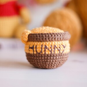 amigurumi pattern
crochet doll pattern
handmade doll
handmade decor diy
cute easy tutorial
craft stuffed toy
honey pot crochet
hunny pooh crochet
winnie the pooh
amigurumi pooh
pooh crochet pattern
hunny pot pooh
pooh amigurumi