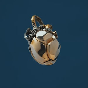 May include: A metallic pendant shaped like a mechanical heart, featuring a polished gold-tone finish on the main body and intricate silver-tone gear-like details at the top. The design incorporates smooth, rounded plates and visible structural joints.