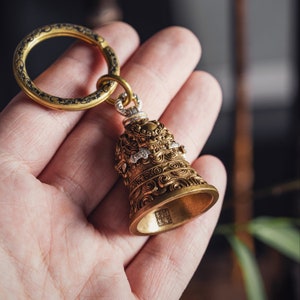 Lion-Biting Sword Bell in Brass with Silver Inlay. Motorcycle Bells. Powerful Amulet Keychain. Handmade Gift for Him. Oriental Art.Ride Safe