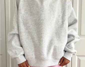 Parelgrijs basissweater met opstaande kraag