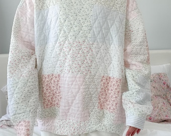 Sudadera acolchada de cuello alto en tonos pastel