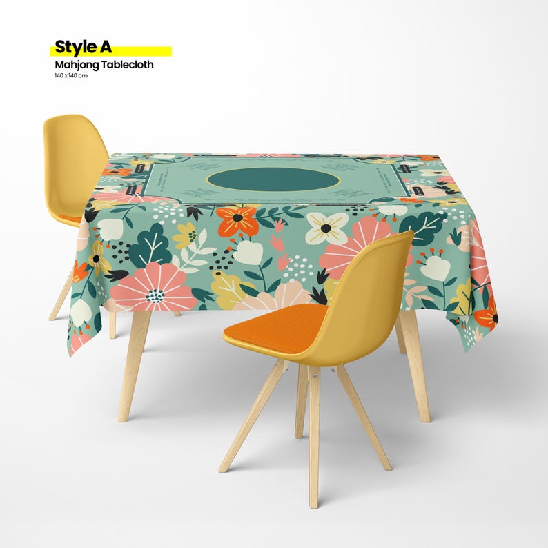 May include: A floral Mahjong tablecloth, 55 x 55 inches, with a teal center and a colorful flower pattern. Two yellow chairs with orange seats are positioned on either side of the table. The text "Style A" and "Mahjong Tablecloth" is visible.