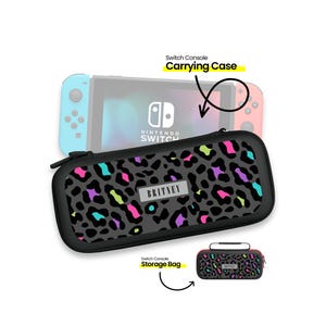May include: A black carrying case with a leopard print design and the name "BRITNEY" printed on it. The case is designed to hold a Nintendo Switch console. A smaller black storage bag with the same leopard print design is also shown.