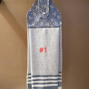 Oven door towel, Kitchen hanging towel, Dish towel, Bathroom hand towel with pearl snap closure.