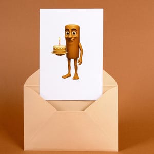 May include: A birthday card featuring a cartoon character made of wood holding a small cake with a lit candle. The card is inside a light brown envelope, set against a brown background.
