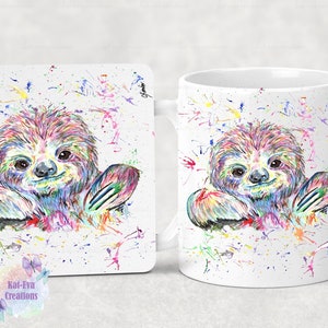 May include: A white ceramic mug and a square coaster featuring a colourful watercolour sloth design. The sloth is depicted with vibrant rainbow hues, surrounded by paint splatters. The coaster and mug are part of a matching set.