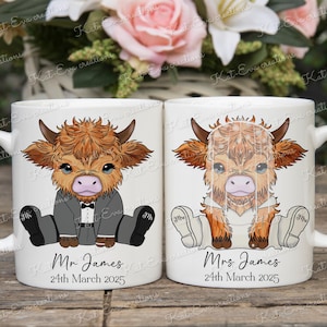 May include: Two white ceramic mugs with handles. Each mug features a cartoon illustration of a Highland cow wearing a wedding outfit. One mug says "Mr. James" and the other says "Mrs. James". Both mugs have the date "24th March 2025" printed below the name.