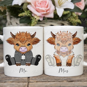 May include: Two white ceramic mugs with handles. The mugs feature illustrations of cartoon Highland cows wearing wedding attire. One mug says "Mr." and the other says "Mrs."
