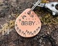 Small dog tag for dogs, teardrop pet tag hand stamped with mountains, double-sided dog tag with up to 2 phone numbers or microchipped product logo