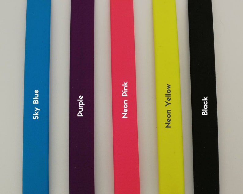 May include: Five coloured strips are displayed, each with its name printed in white. The colours are sky blue, purple, neon pink, neon yellow, and black, arranged from left to right.
