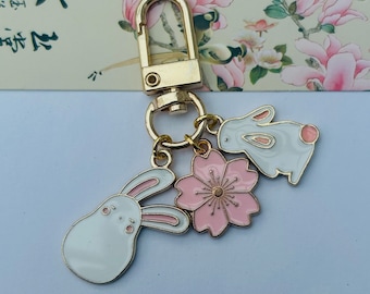 Kawaii Bunny Keychain: Sakura Flower Charm, Phone Case Decor