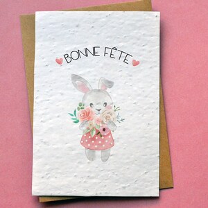 Karte zum Pflanzen von Happy Birthday-Aquarellkaninchen. Gesäte Muttertagskarte.