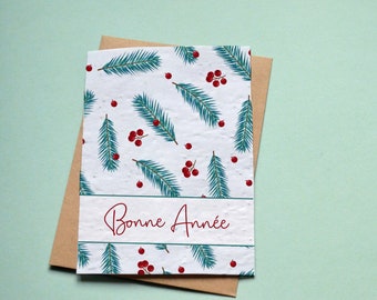 Carte à planter Bonne année branches de sapin. Carte de voeux fleurie.