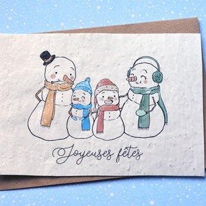 Carte à planter Joyeuses fêtes Bonhomme de neige. Carte de voeux fleurie.