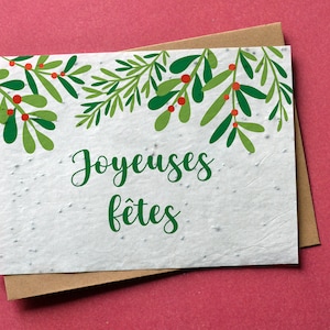 Card to plant Happy Holidays Branches of mistletoe. Greeting card to plant.