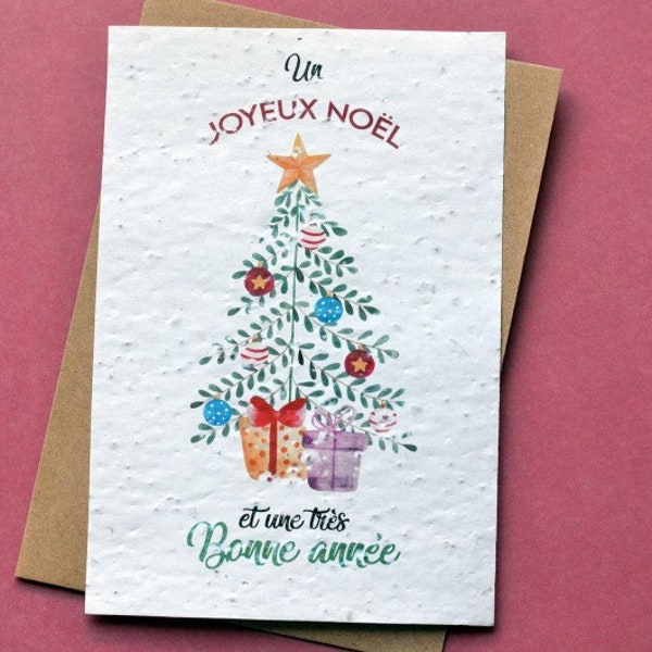 Carte à planter Joyeux Noël Sapin Aquarelle. Carte de voeux fleurie.