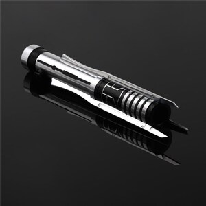 May include: A silver and black lightsaber with a black handle and a silver blade. The blade is retractable and has a black grip.