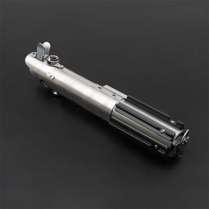 May include: A silver lightsaber with a black handle and a red button. The lightsaber is a popular toy and collectible for fans of Star Wars.