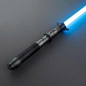May include: A black lightsaber with a blue blade. The lightsaber has a textured grip and a black handle with a red button.