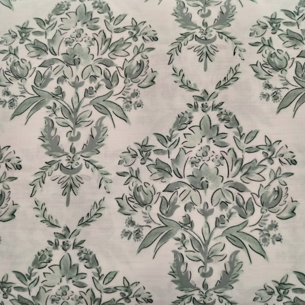 Sage Chinoiserie Roman shade will make any room warm and inviting.