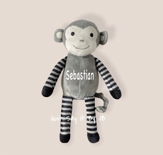 gray stuffed monkey