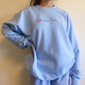 Baby Blue graphic dinosaur crewneck sweatshirt