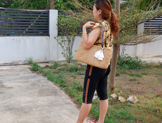 Straw and shop leather handbags