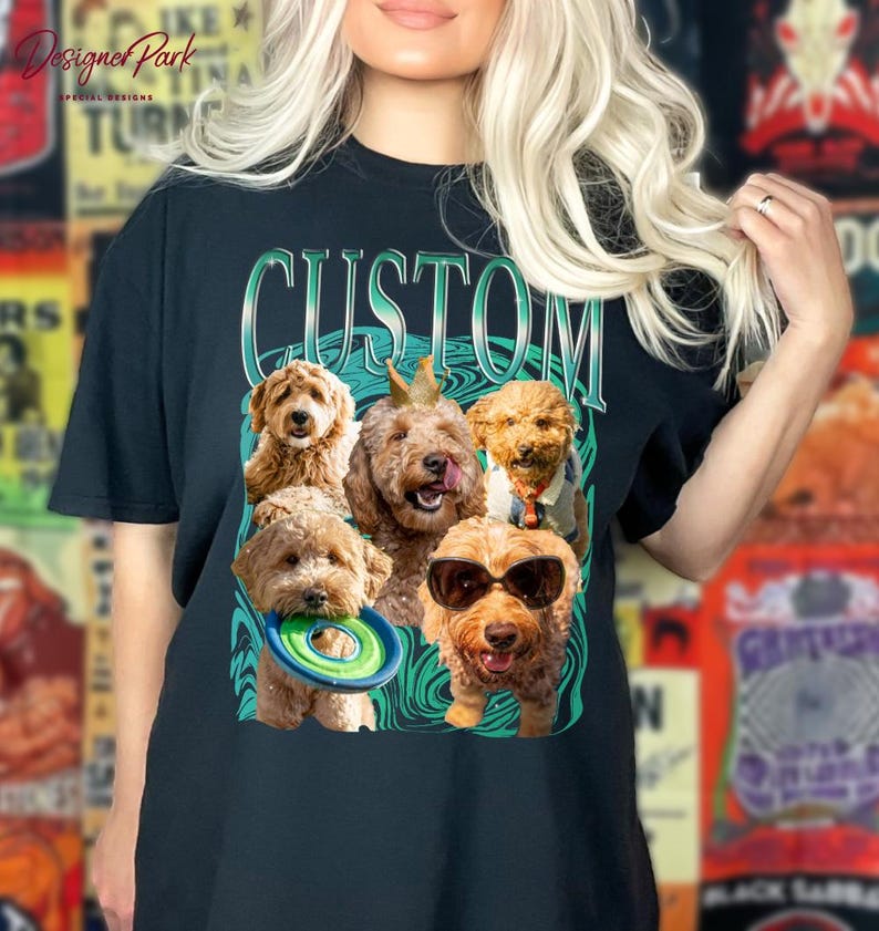 A woman wearing a black t-shirt with a graphic design featuring a group of dogs, including a golden retriever, a poodle, and a dachshund, all wearing sunglasses and holding a frisbee.