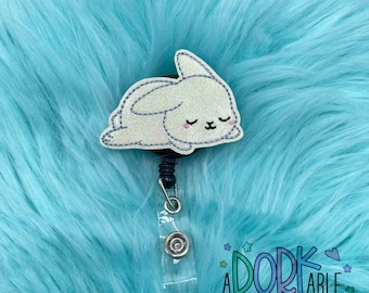 Carrete de insignia de conejo cansado