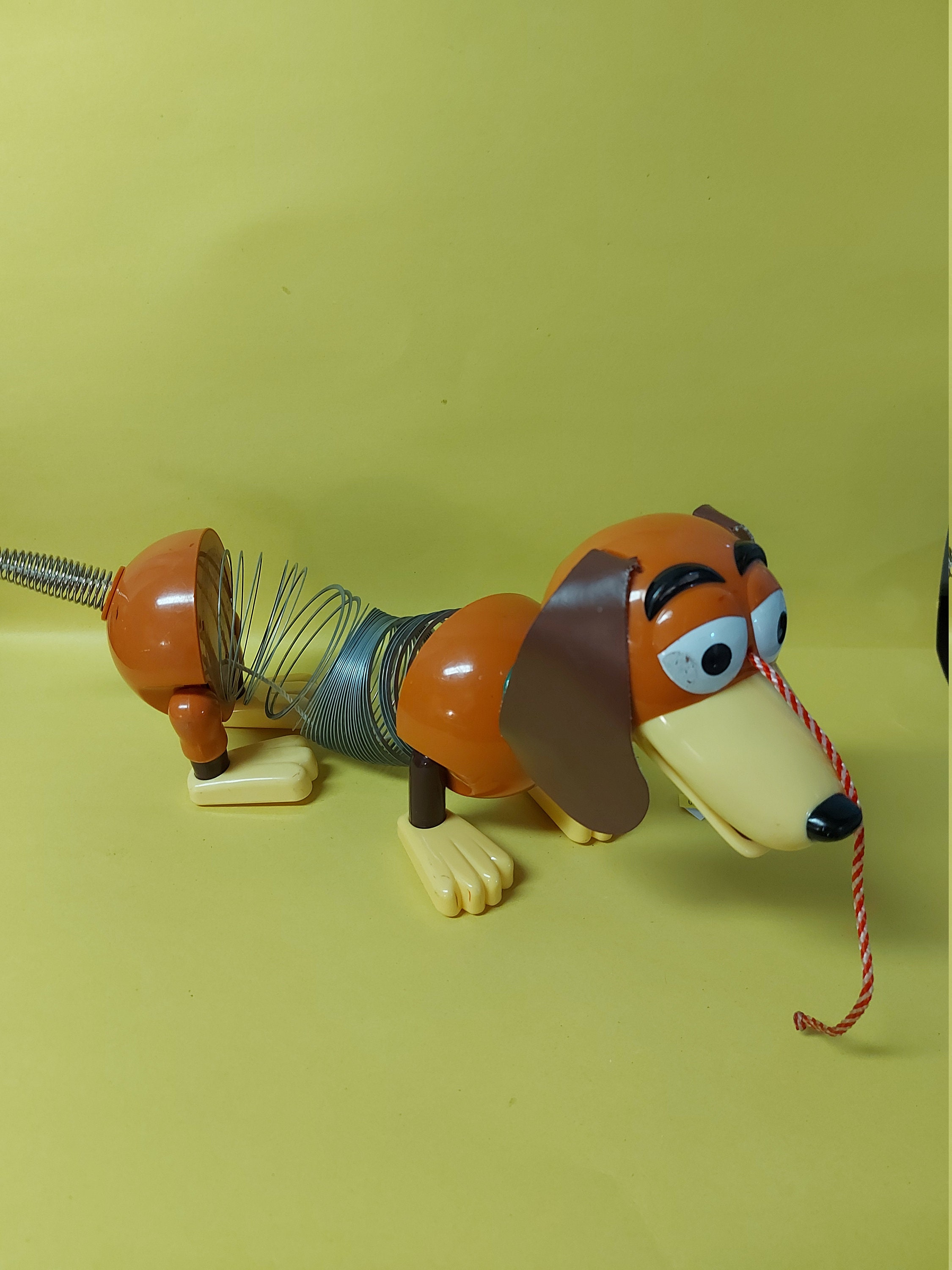 dog on a string toy