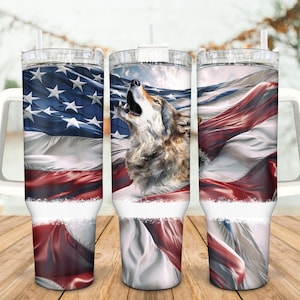 May include: A stainless steel tumbler with a white handle and a design featuring a wolf howling against a waving American flag.