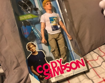 Cory Simpson dolls
