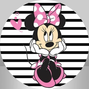 May include: A black and white striped background with a cartoon image of Minnie Mouse. Minnie Mouse is wearing a pink dress with white polka dots and a pink bow with white polka dots. She has a big smile and is sitting with her legs crossed.