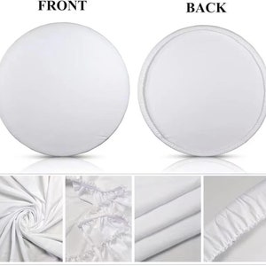 May include: White round fabric backdrop with a ruffled edge. The backdrop is shown from the front and back. The fabric is smooth and wrinkle-free.