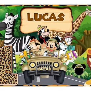 May include: A vibrant birthday illustration with a safari theme, including a zebra, giraffe, and cartoon characters in a jeep. The number "1" is decorated with a leopard print, and the name "LUCAS" is displayed on a wooden sign.