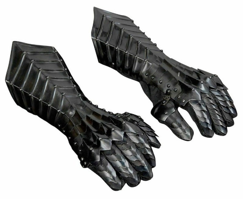 May include: A pair of black metal gauntlets with a scaly design. The gauntlets are fully articulated and have a pointed design on the fingers.