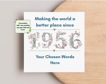 Pode incluir: Um cartão de felicitações quadrado com o texto Making the world a better place since 1956, com os números decorados com padrões florais. Abaixo dos números, o texto diz Your Chosen Words Here, com uma pequena nota de personalização.