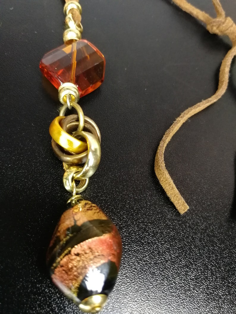 brown leather necklace with colored glass pendant