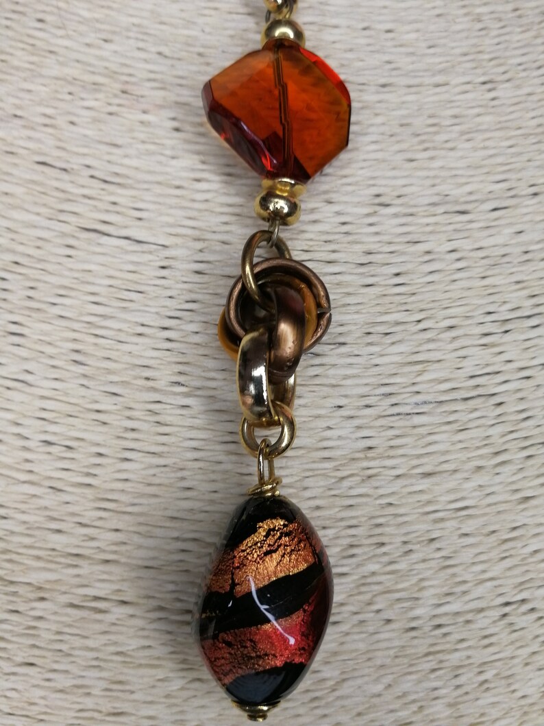 brown leather necklace with colored glass pendant