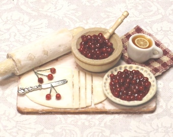 Cherry Pie Prep Board; one-inch scale; 1:12 scale; cup of tea; pie mix; cherry pie; dollhouse miniature food