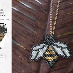 May include: A gold chain necklace with a black, white, and gold beaded bee pendant. The bee is made with brick stitch beading and has a detailed design.