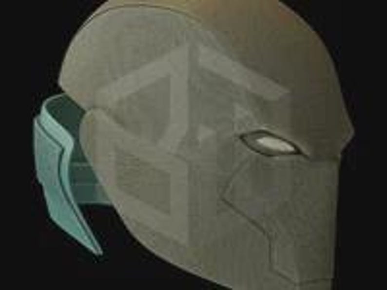 May include: A digitally rendered, gray helmet with a geometric design on the front and a light blue strap. The helmet has a futuristic aesthetic, with a stylized eye slit.