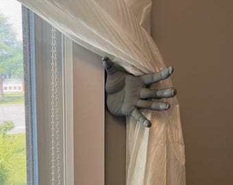 Demon hand curtain hooks